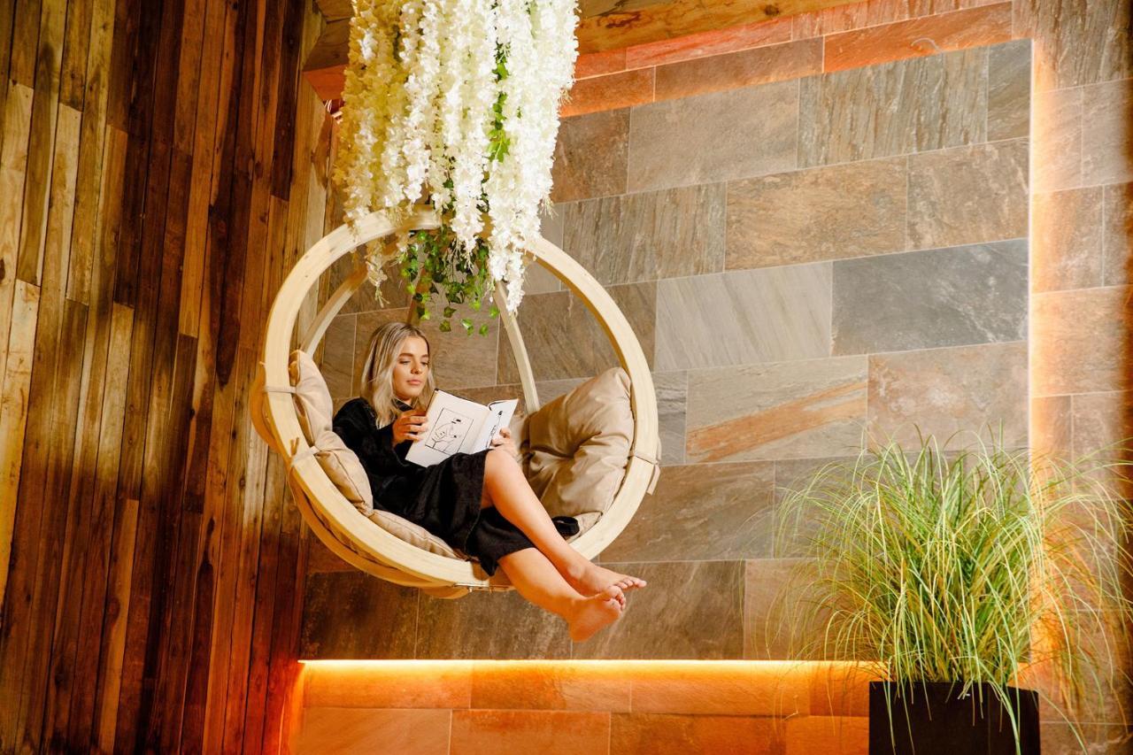 Lanelay Hall Hotel & Spa Hensol Bagian luar foto A woman relaxing in a spa