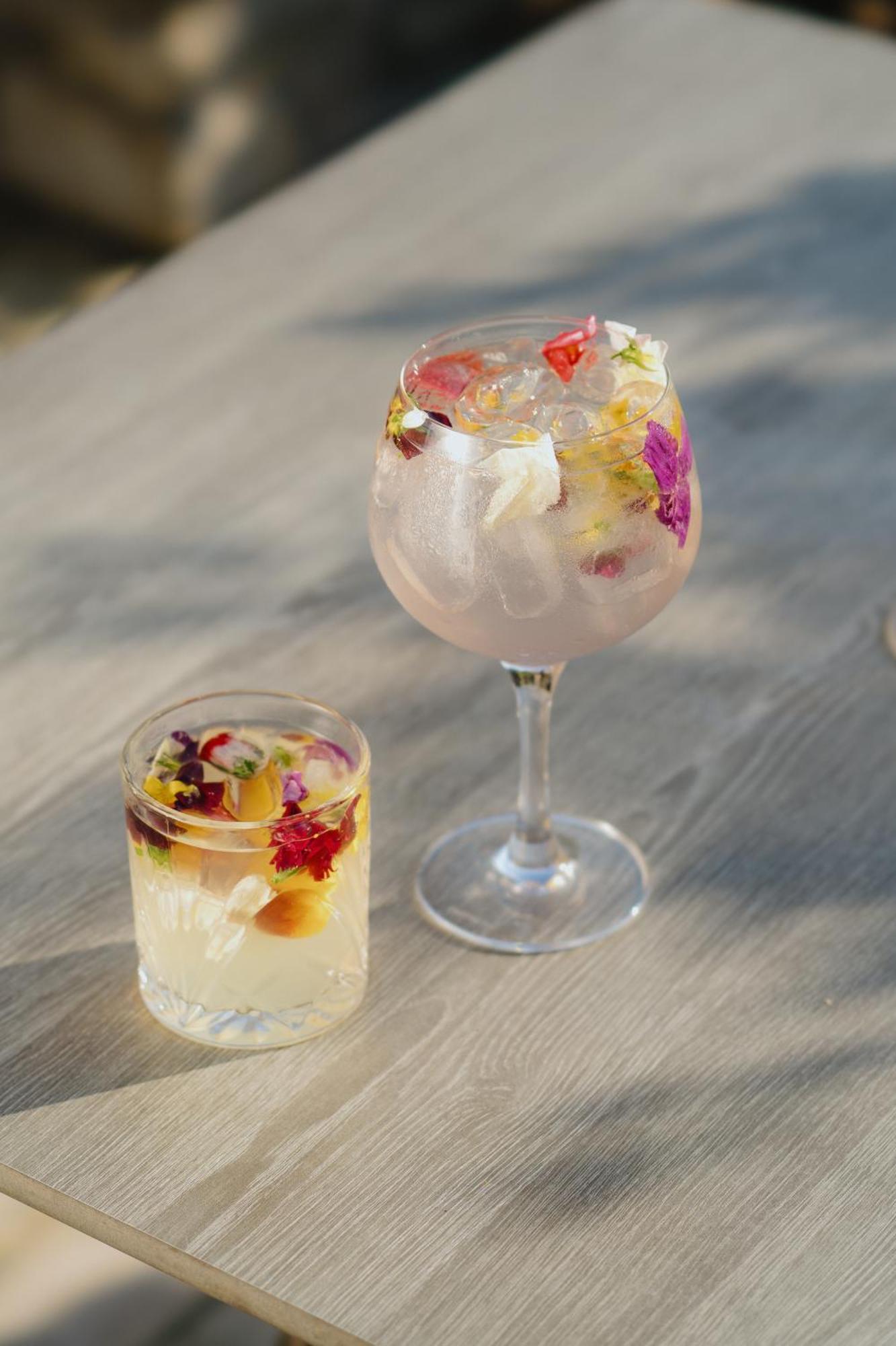 Lanelay Hall Hotel & Spa Hensol Bagian luar foto A gin and tonic with edible flowers