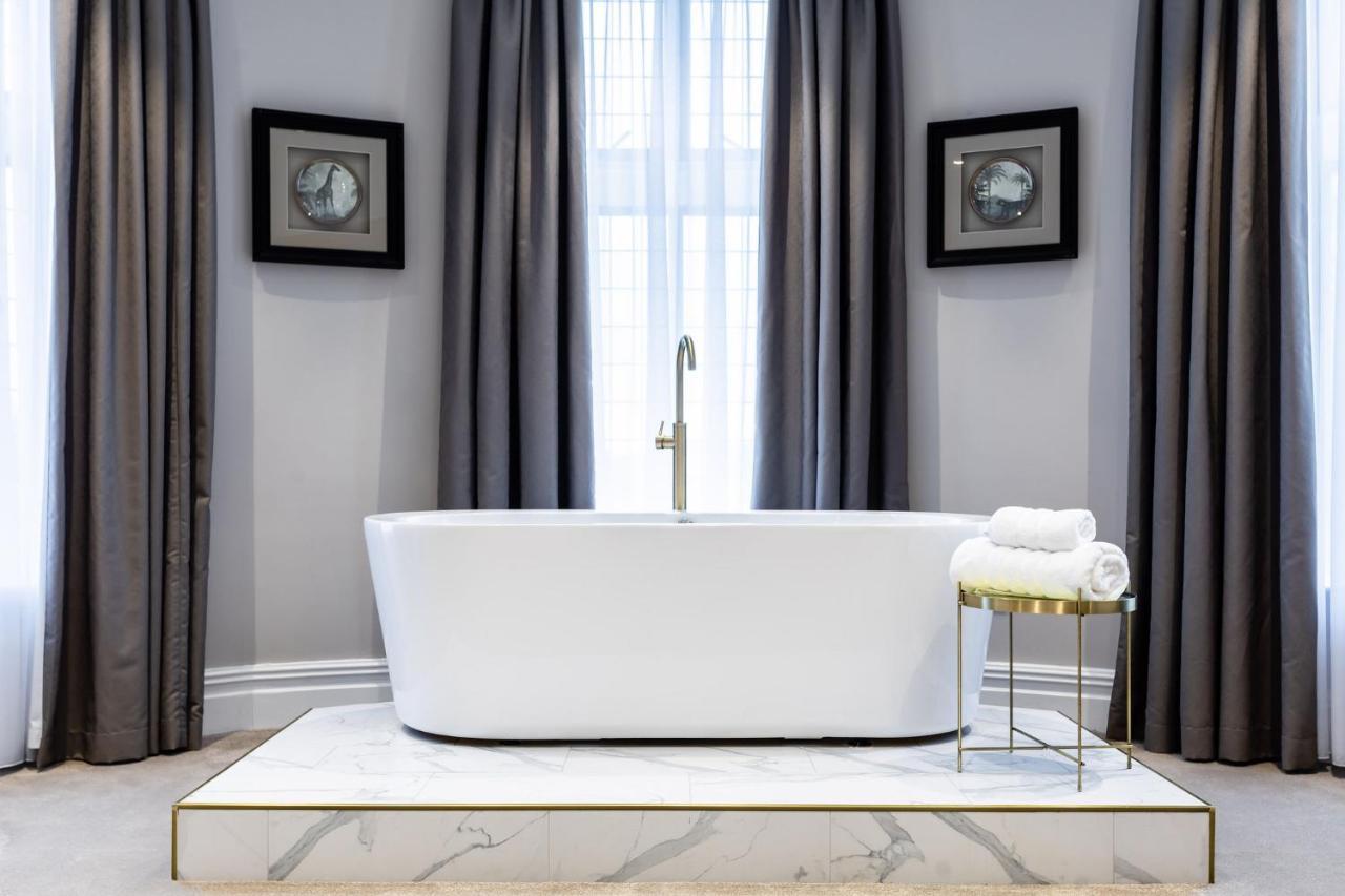 Lanelay Hall Hotel & Spa Hensol Bagian luar foto A freestanding bathtub